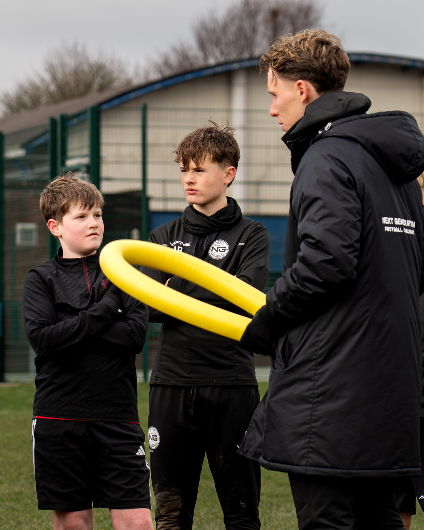 NGFC coach demonstrating a movement pattern to players