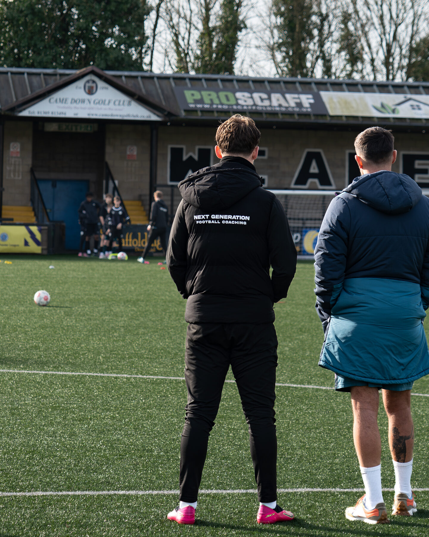 Players training in front of the main stand