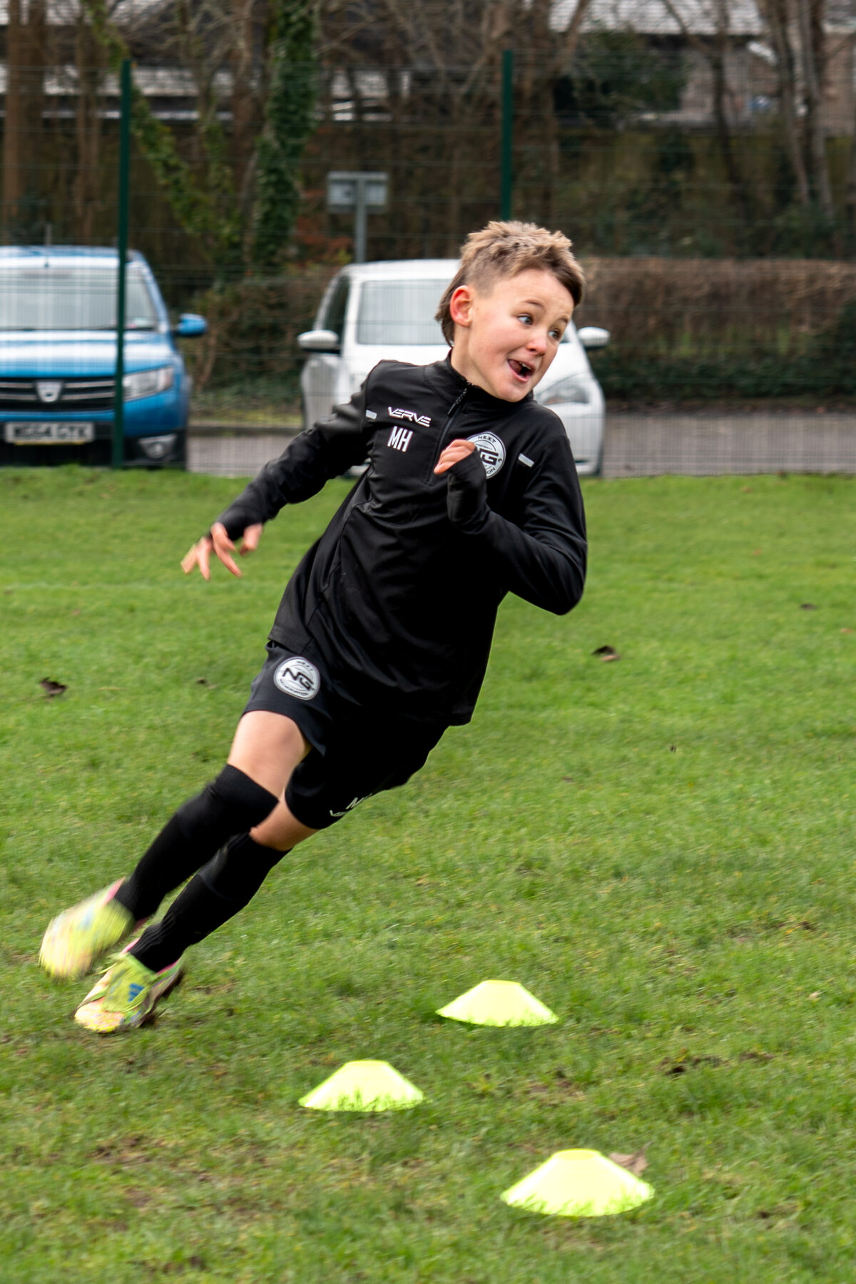 Player accelerating between cones during an NGFC drill