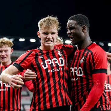 Euan Pollock celebrating in an AFC Bournemouth kit during a match